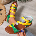 Women's flat sandals with Velcro strap, round toe, and rubber sole in black, brown, or colourful.