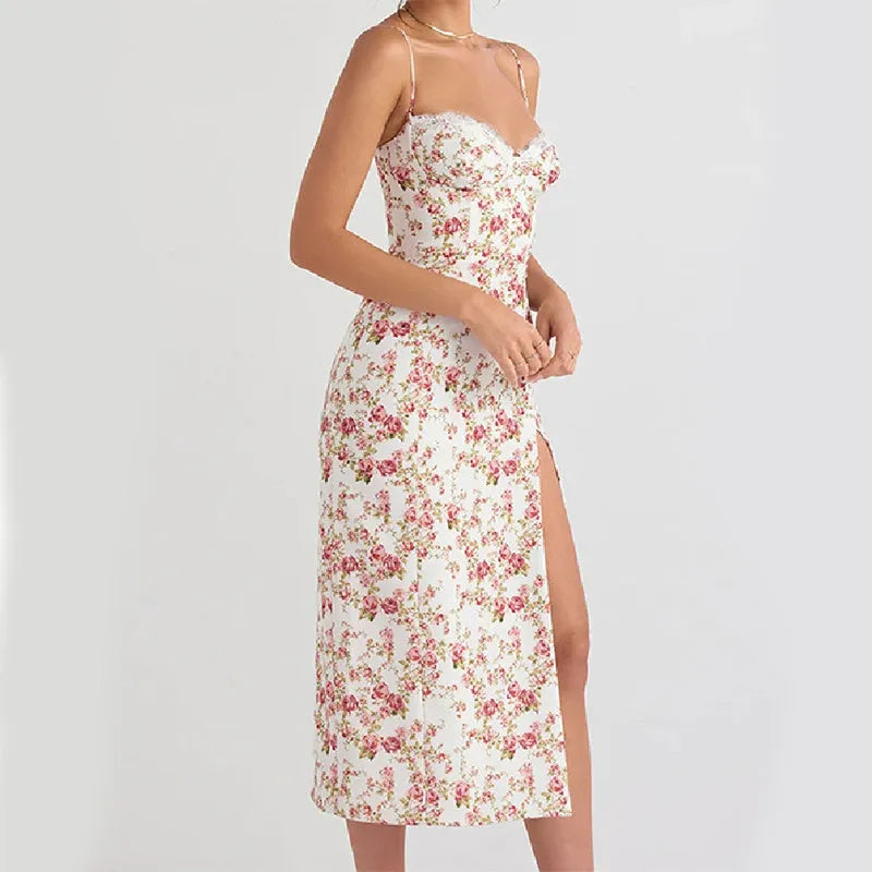 Women's long blue dress with lace flower print, suspender straps, and a high side slit.
