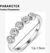 925 silver round moissanite ring with white gold electroplated finish on a geometric band, available in sizes 5 to 9