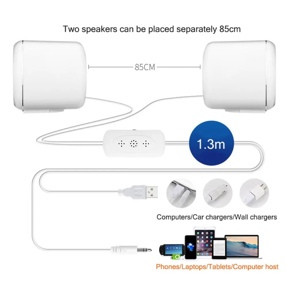 Compact black desktop speakers with 3.5mm cable and volume scroll wheel