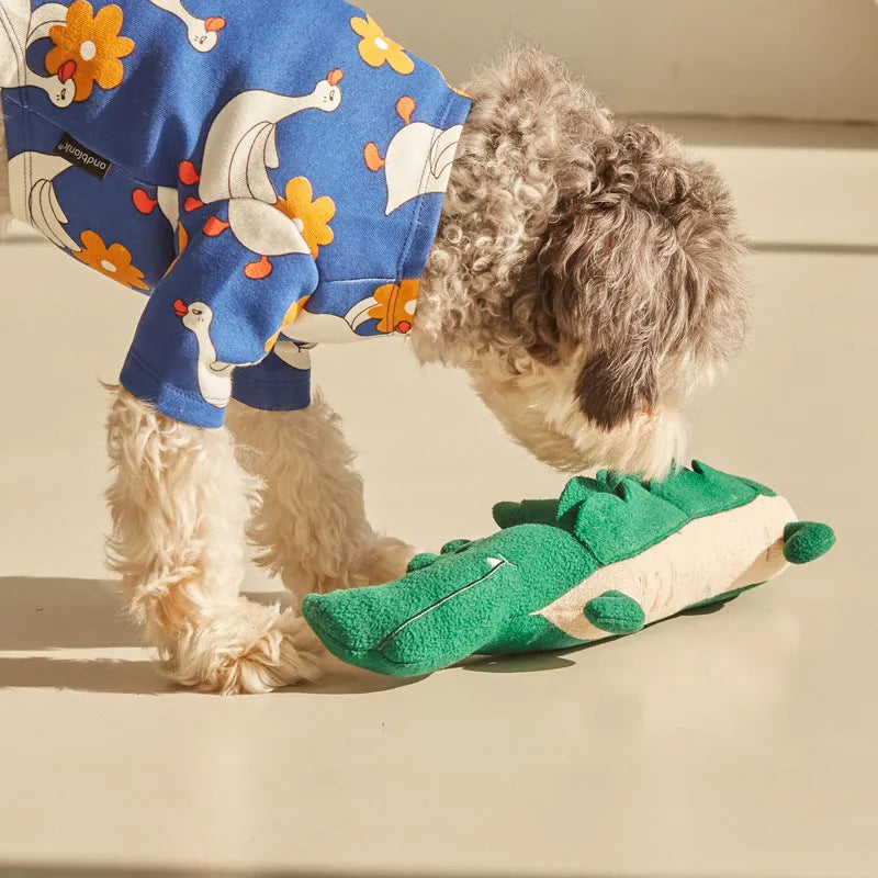 Green plush dog toy measuring 35cm long with soft fabric construction