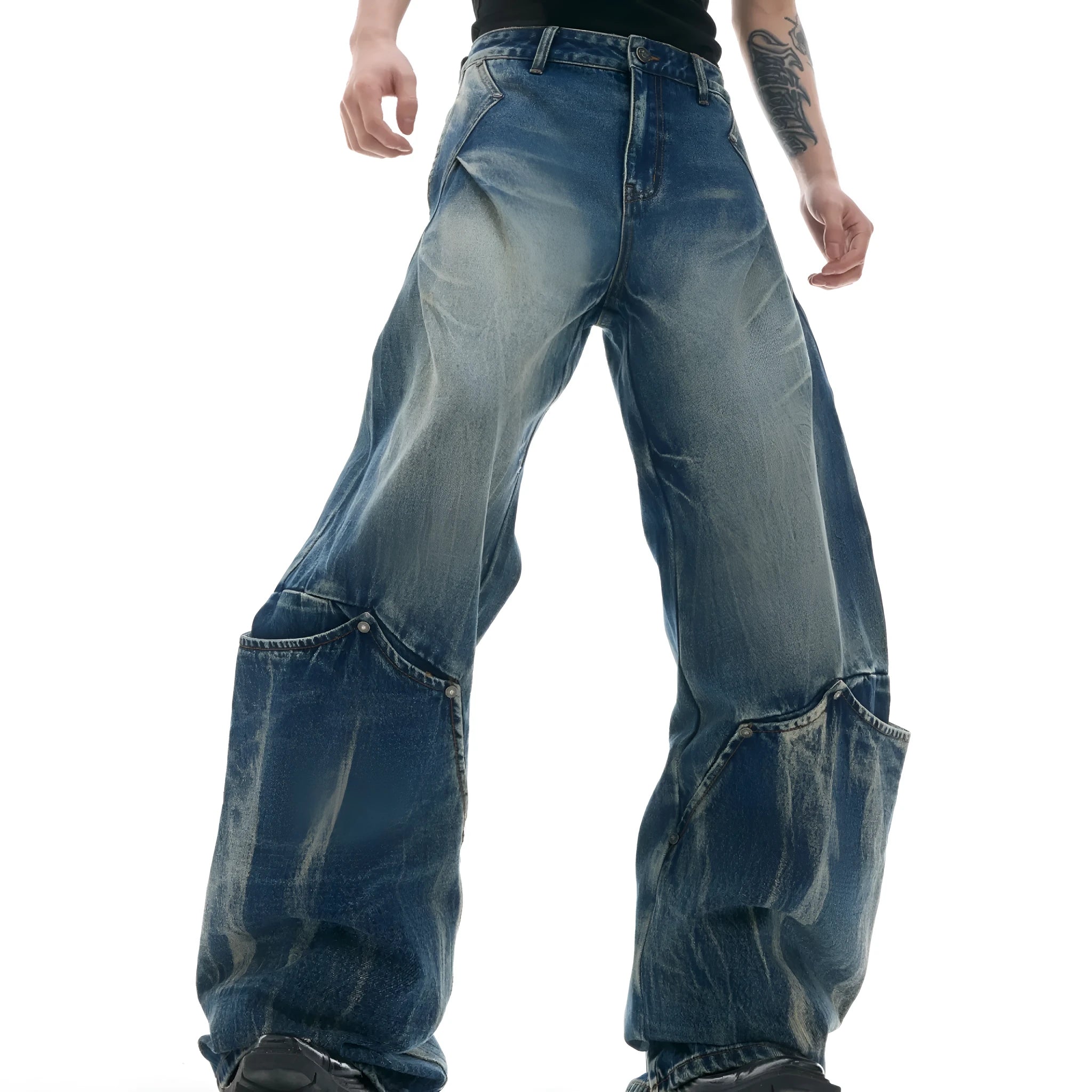 Men's verdant blue retro jeans with washed burst pattern and curved knife cut in loose fit