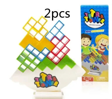 Balance stacking game with 16 plastic building blocks, chassis, and base on a table