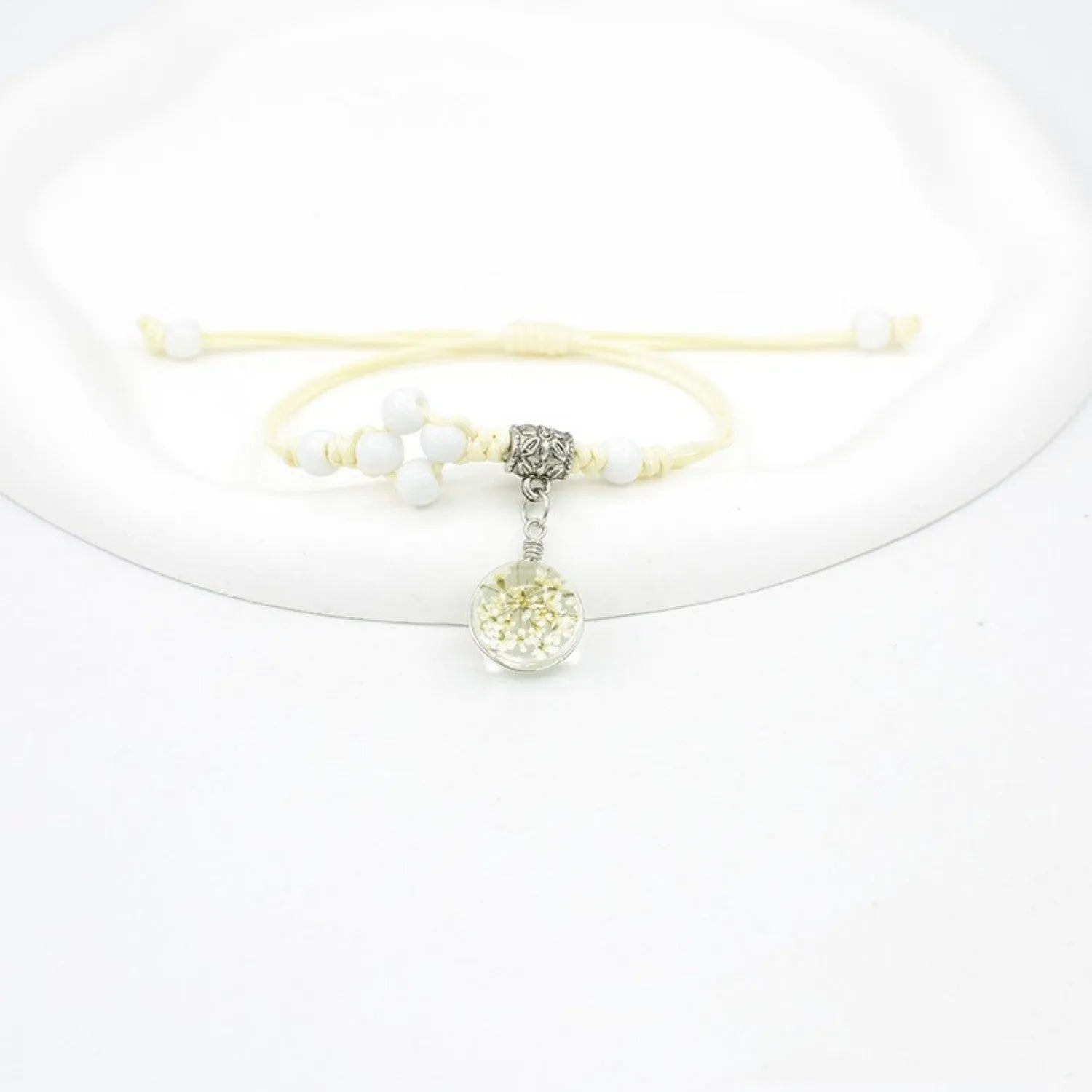 Glass bracelet with dried flowers inside 1.4cm beads on lace-style band in multiple colour options