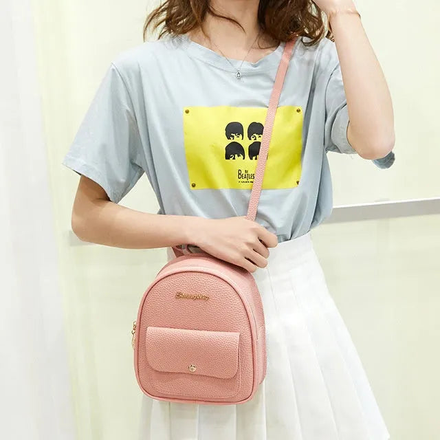 Women small solid colour PU backpack with zip closure for mobile phone and student travel use