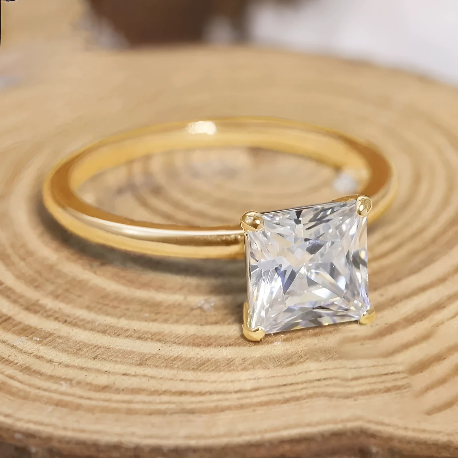 Simple geometric round 925 sterling silver women's ring in gold, rose gold, and silver colour options.