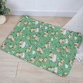 Reusable waterproof pet training pad in animal print design on a wooden floor.