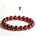 Natural orange red garnet ball crystal bracelet with Ruyi design element in unisex retro style