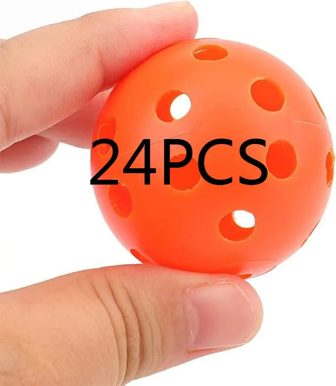 Multi-colour golf practice balls in net bag with 26-hole putting layout for skill development