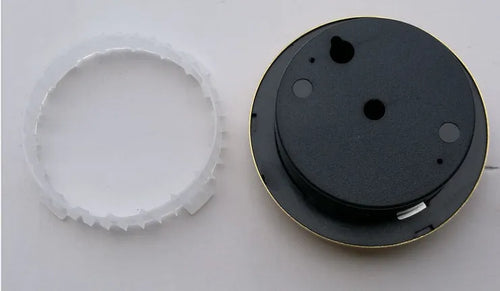 Analogue thermometer and hygrometer with aluminium outer ring and dial for indoor climate monitoring
