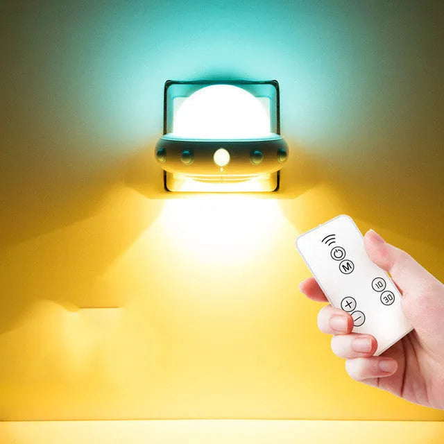 Remote control UFO shaped bedside night light in white, blue or pink colours