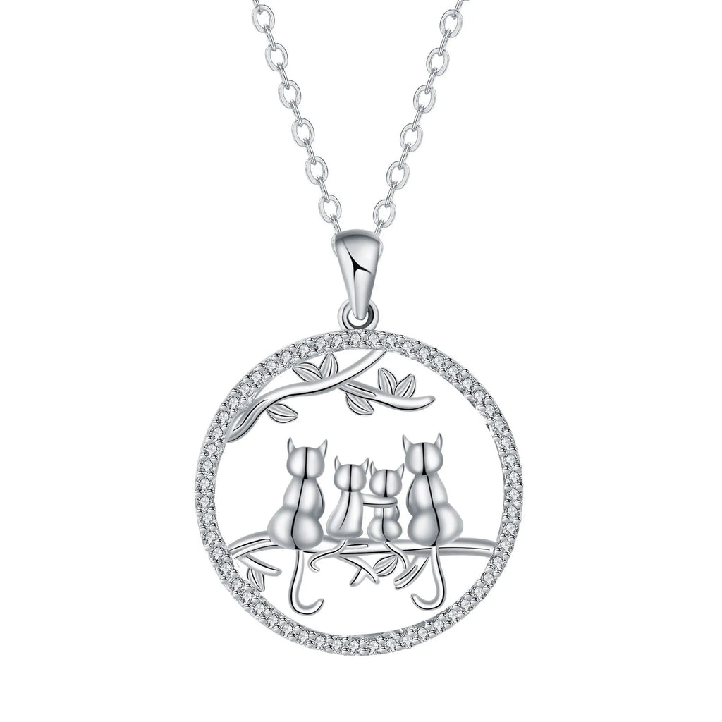 Women's copper necklace with a four kitten pendant on a cross chain, electroplated finish.