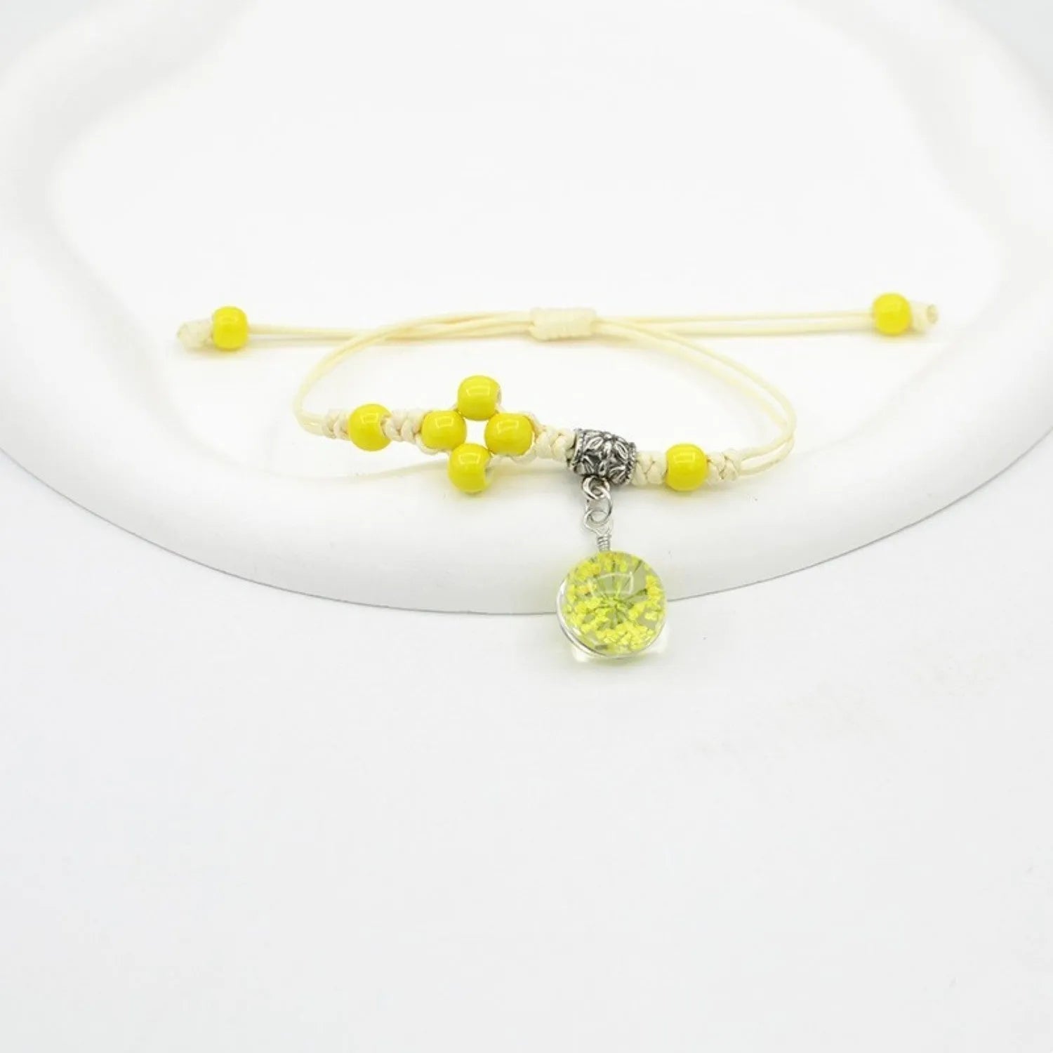Glass bracelet with dried flowers inside 1.4cm beads on lace-style band in multiple colour options