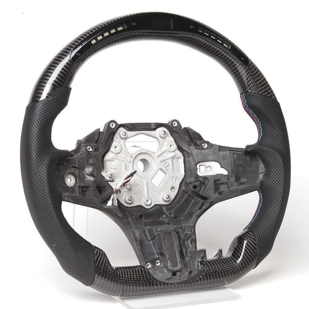 Black carbon fibre steering wheel for BMW X3 X5 with LED controls and sport package styling