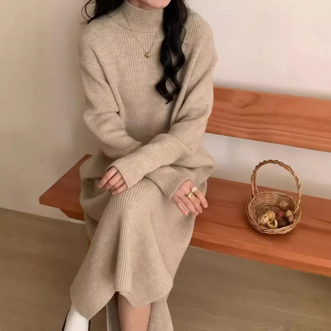 Acrylic knit high waist mid-length dress in solid colour with long sleeves.