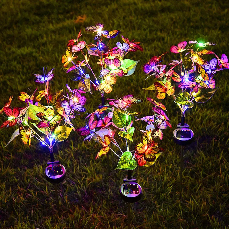 Solar butterfly courtyard light LED lawn lamp with IP65 protection, four colour options, on grass