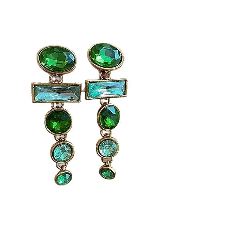 A pair of green gradient tassel earrings with geometric alloy settings and inlaid zircon stones.
