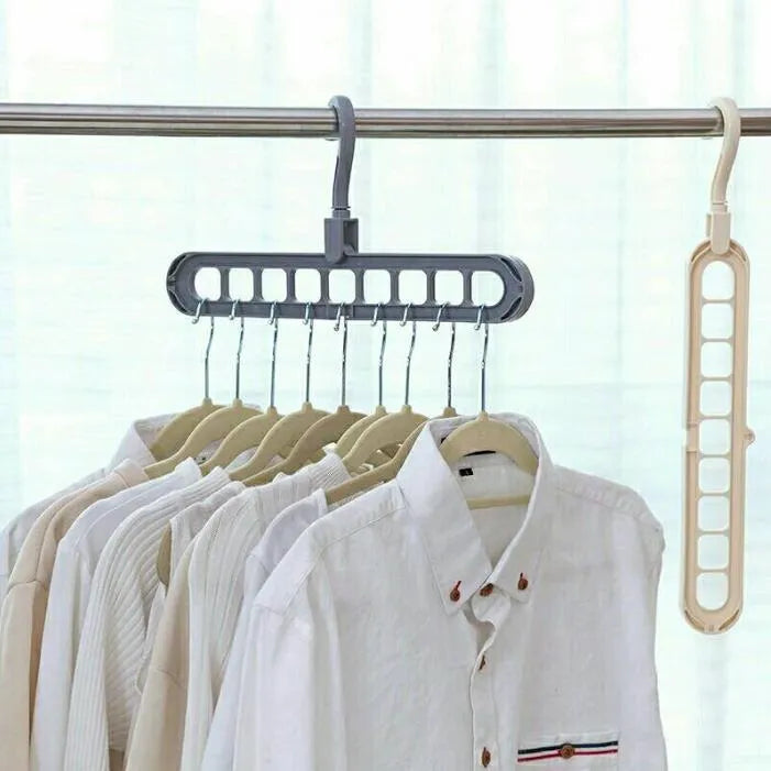 Plastic clothes hanger with rotating hook in pink colour