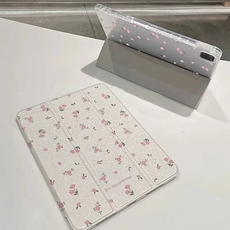 Transparent floral tri-fold iPad case with magnetic stand bracket shown open