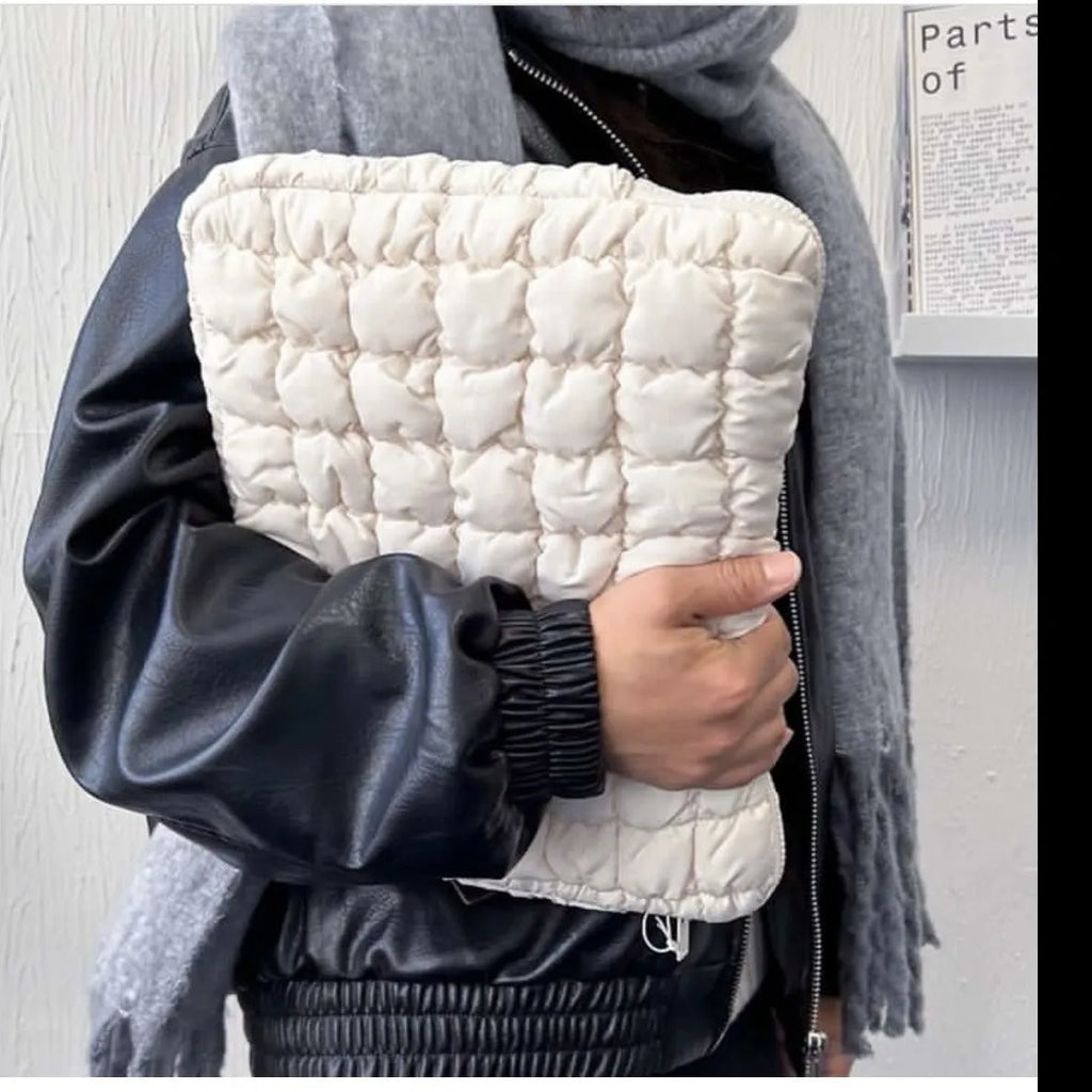 Black nylon laptop shoulder bag showing large capacity and shoulder strap