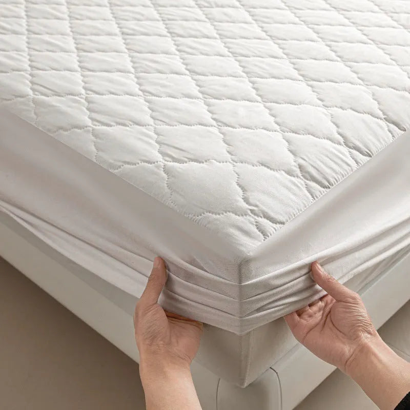 Diamond lattice quilted waterproof mattress protector set with fitted sheet and pillowcases in bamboo fibre