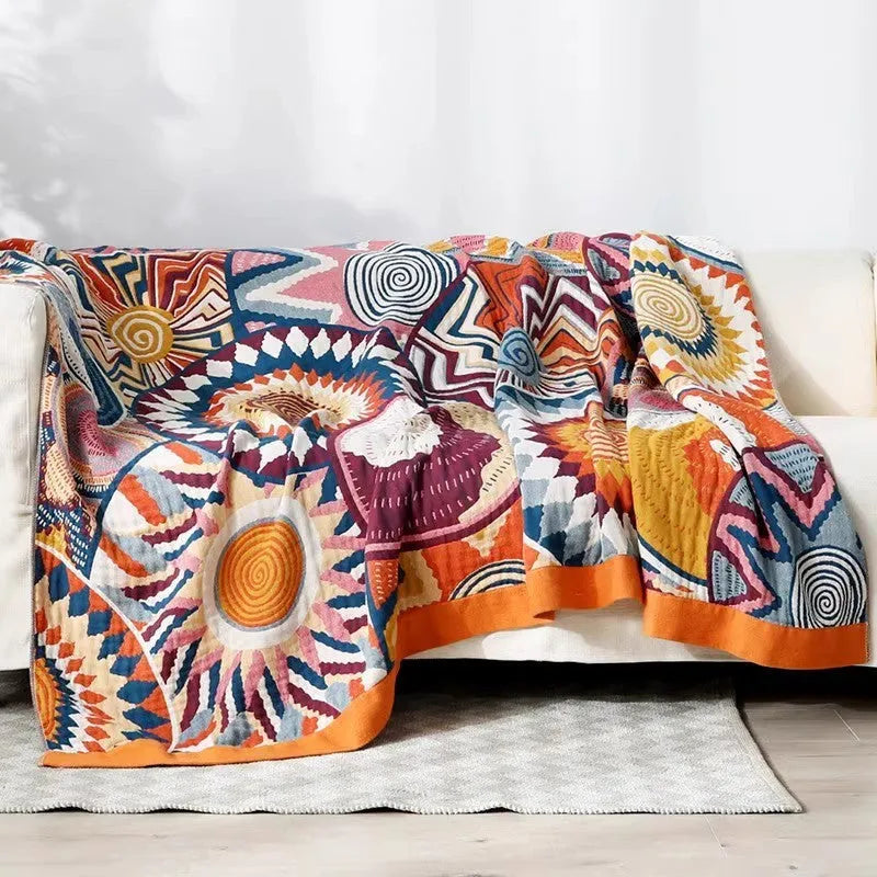 Five-layer cotton gauze bed blanket with Roulette Wheel Blue pattern showing modern simplicity design