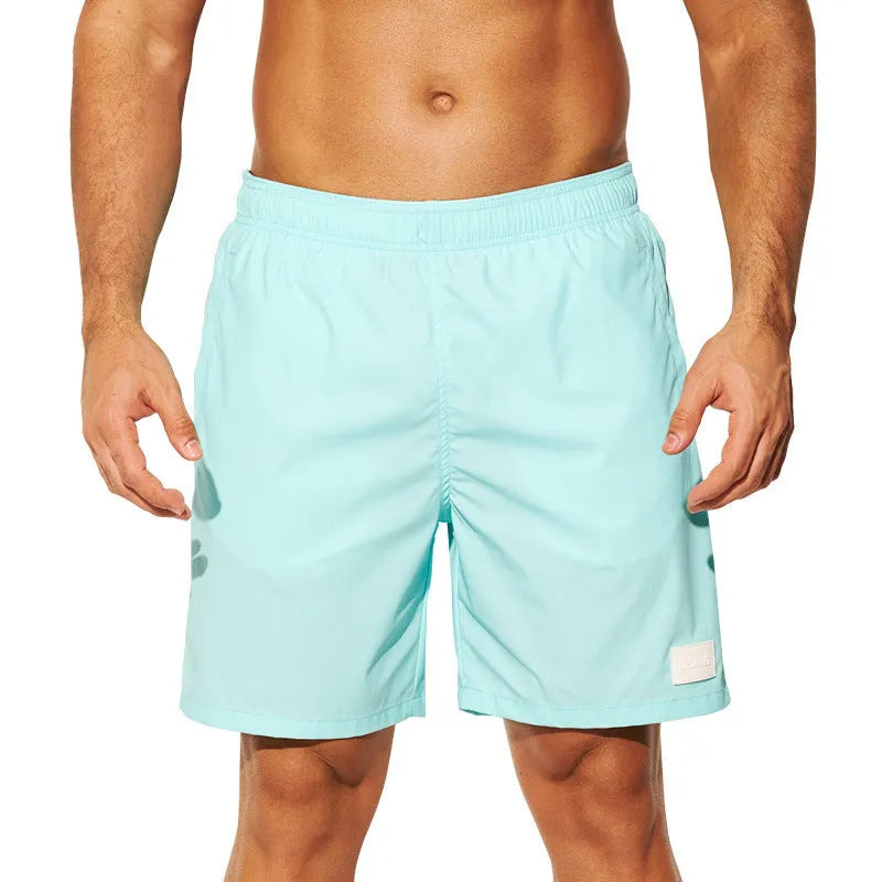 Men's solid colour quick-dry nylon casual shorts with straight leg opening