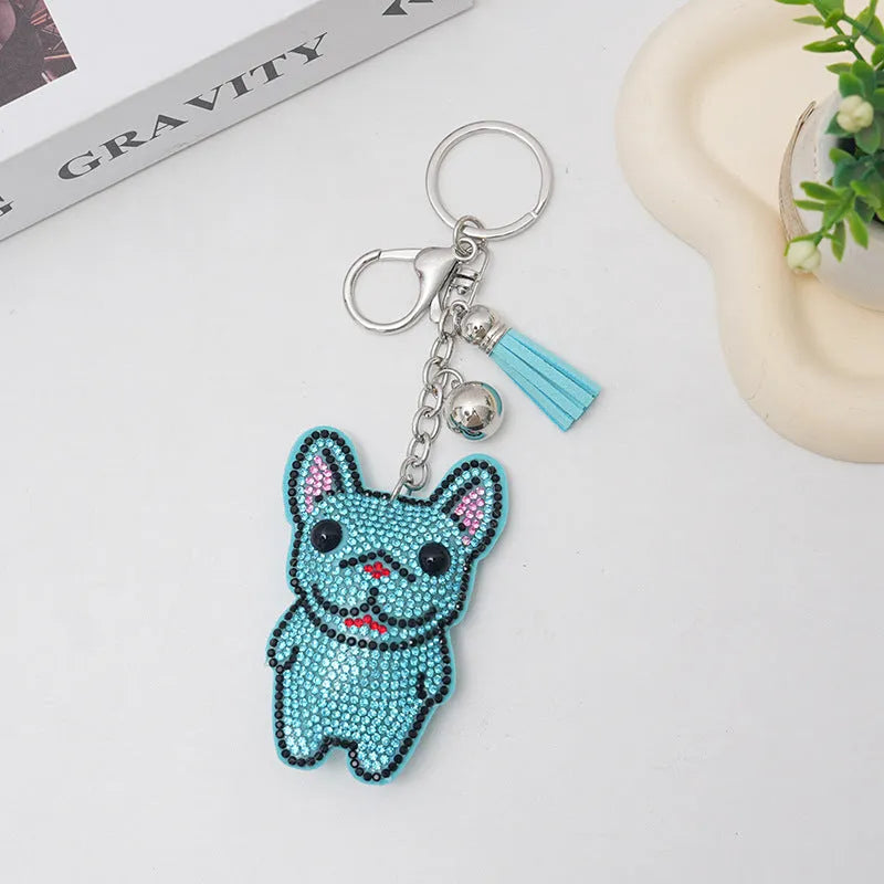 Colourful cartoon animal rhinestone keychain on a metal ring.
