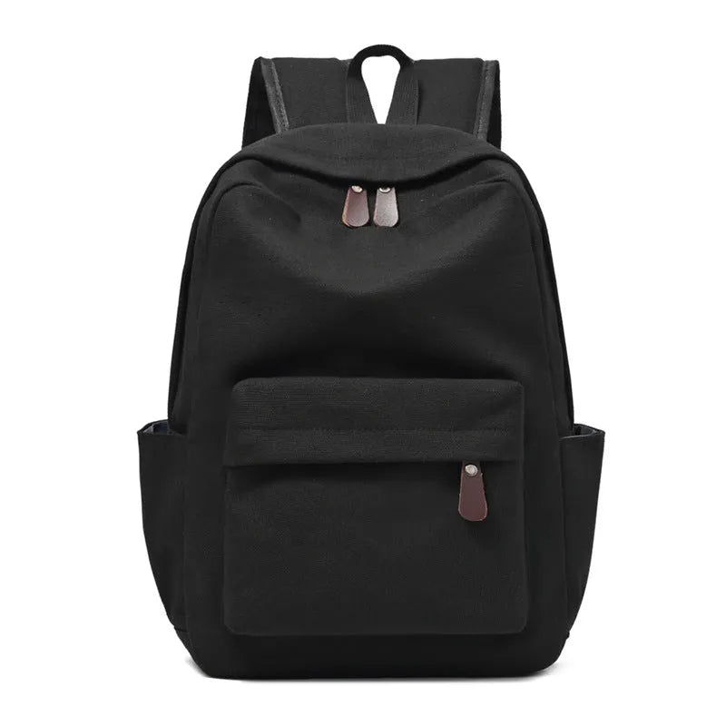 Canvas large capacity travel backpack in solid colour for men and women, available in brown
