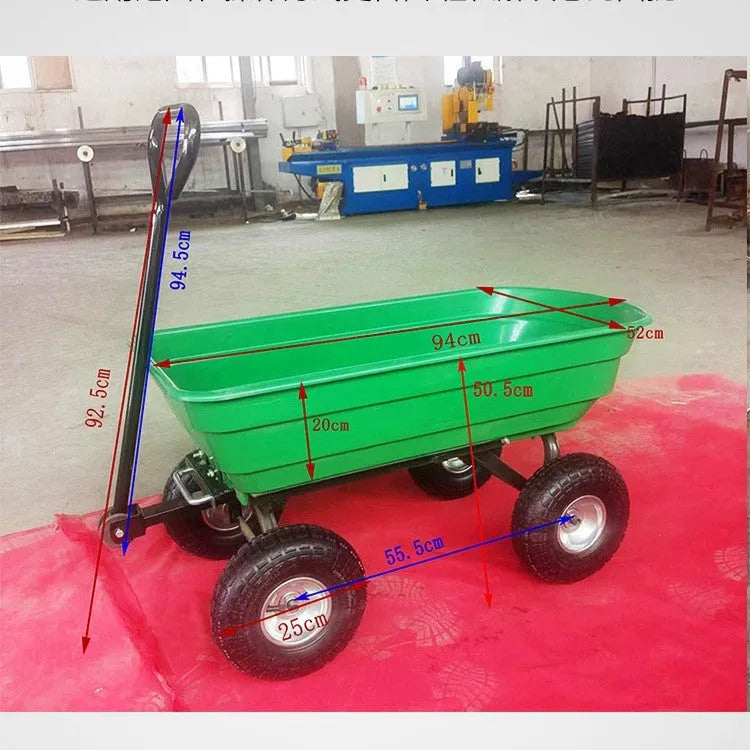 Green four-wheel plastic dumptruck with a large haulage body on a steel-reinforced frame.