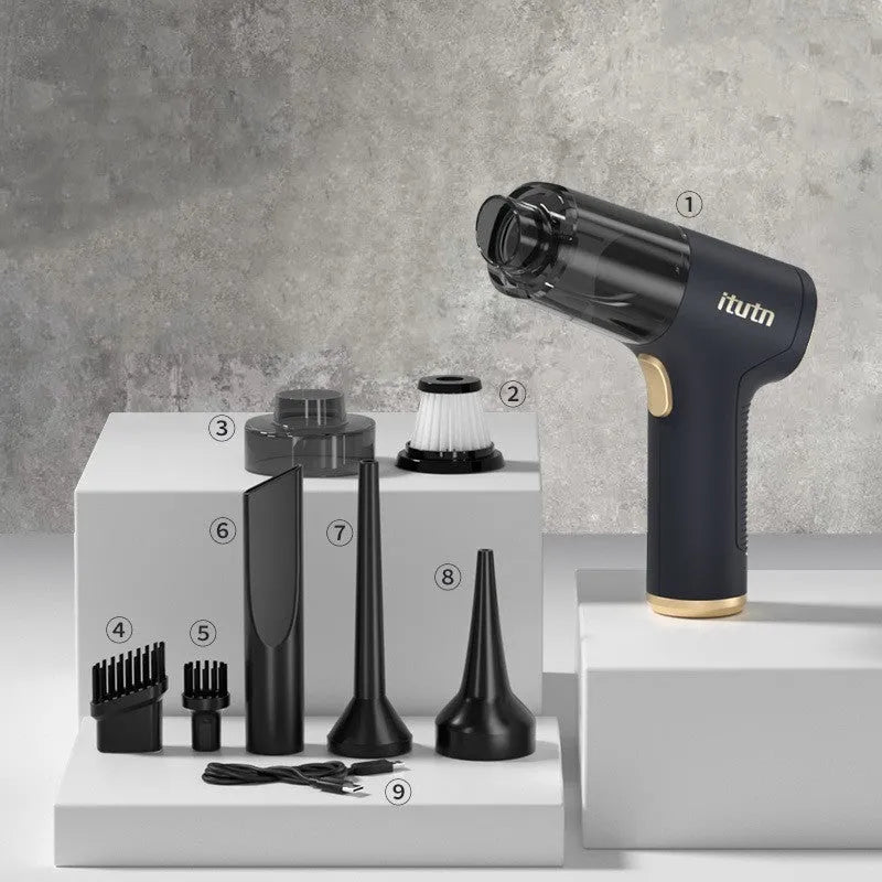 Black wireless handheld vacuum cleaner with tyre inflator and multiple nozzle attachments