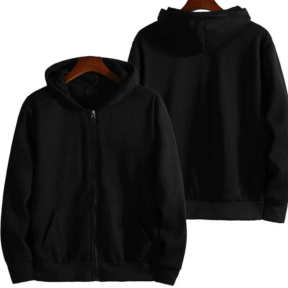 Man wearing a solid colour loose fit zip-up sports jacket.
