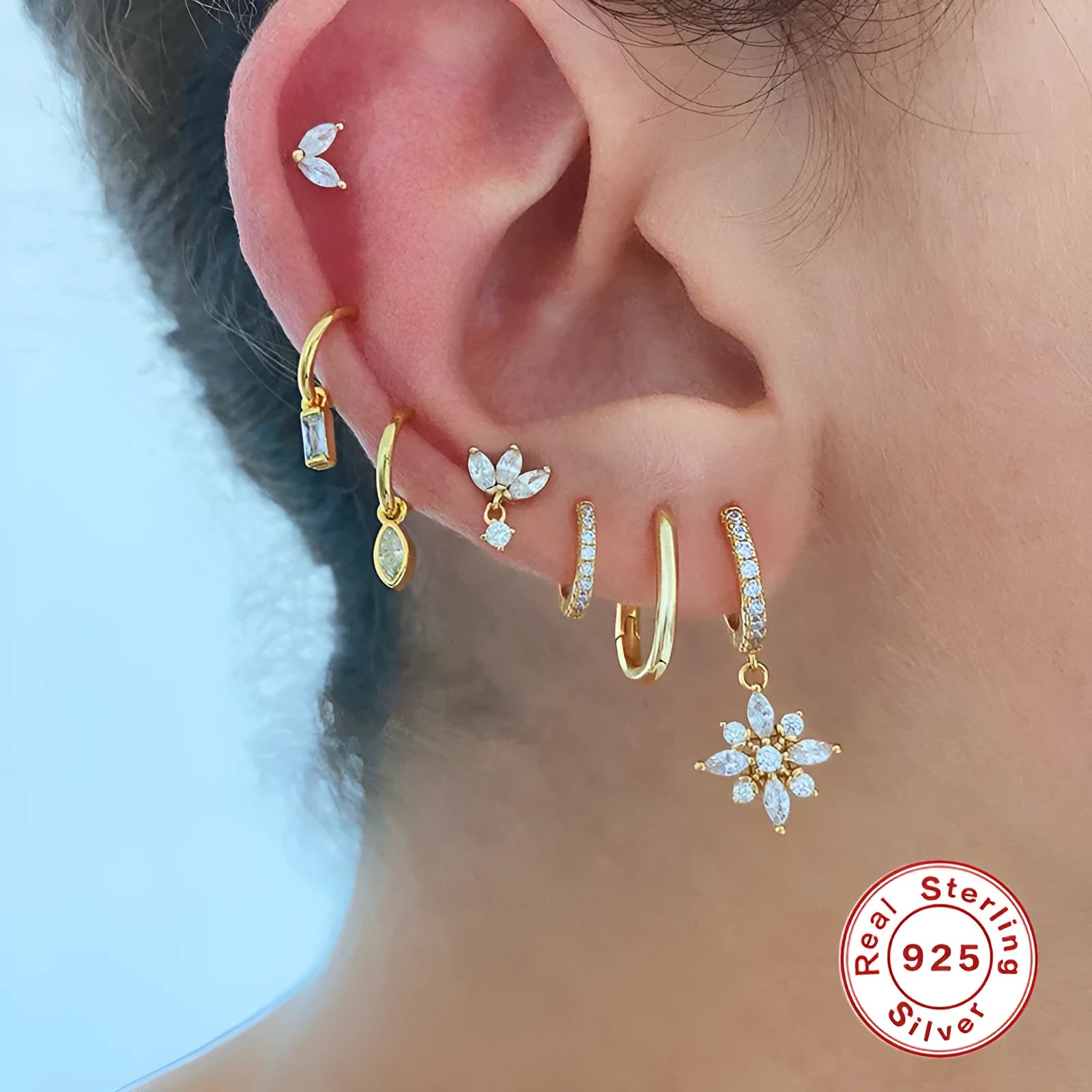 Sterling silver snowflake pendant earrings with diamond accents in white gold or yellow gold colour finish.