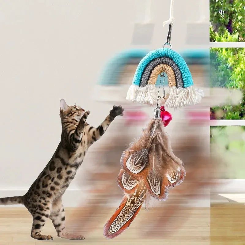 Blue feather cat toy hanging from door with elastic rope and sticky buckle clamp for interactive play