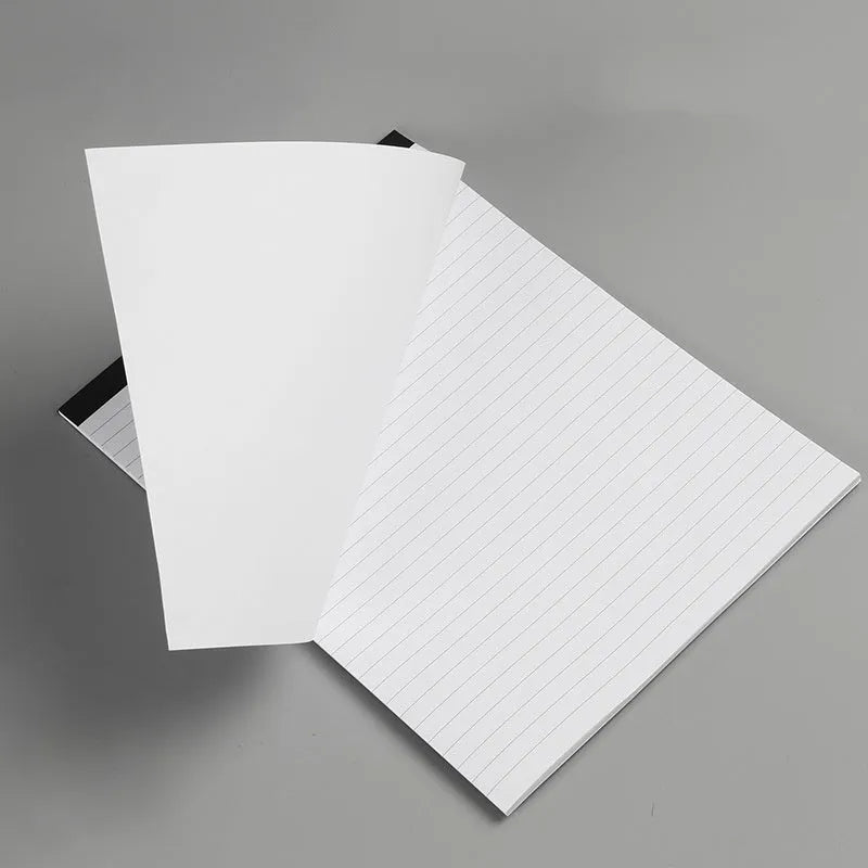 A4 tearable notebook with grid-lined ivory pages and a paper cover.