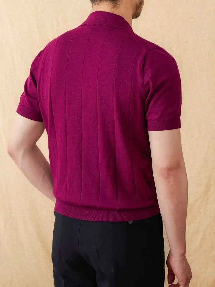 Short sleeve knitted polo shirt in a ramie-cotton blend with a seagull collar, shown in purple.