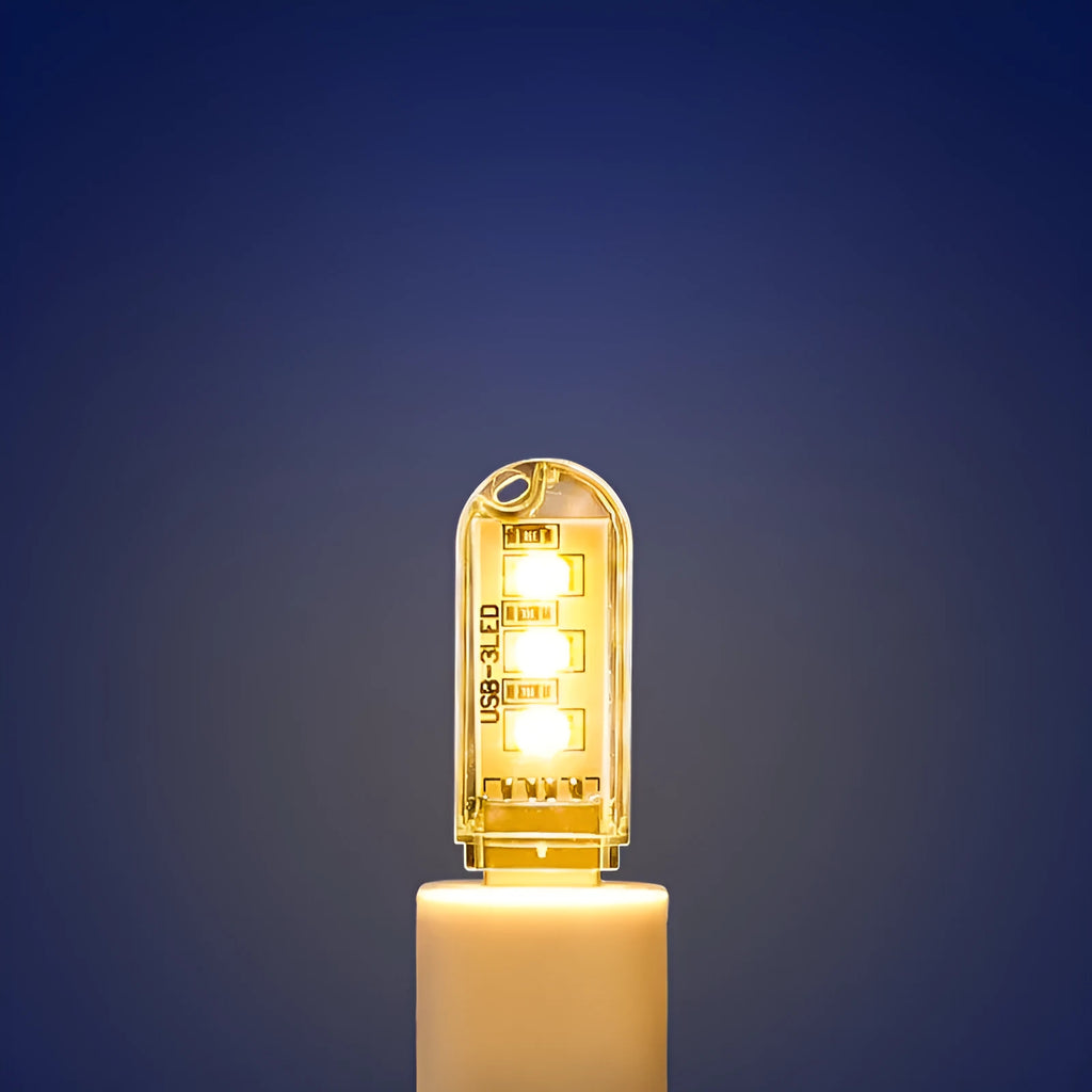 LED baby night light with USB cable showing white and warm light options