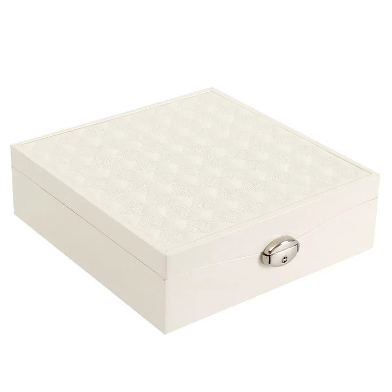 Red and white minimalist PU leather jewellery storage box for necklaces and rings, 21cm diameter.