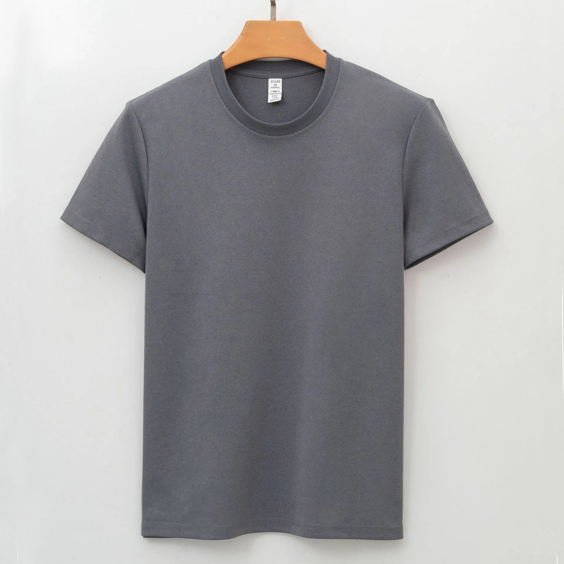 Solid colour short sleeve pullover with regular sleeves and straight cut silhouette