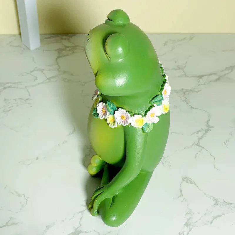 Magic Yoga Frog home ornament in RDW123 colour on a wooden shelf.