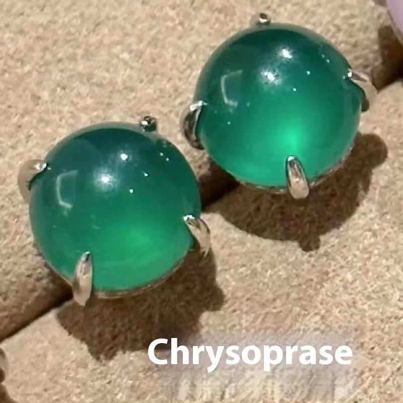 Chalcedony stud earrings with round egg stone in copper four-claw setting, emerald green colour