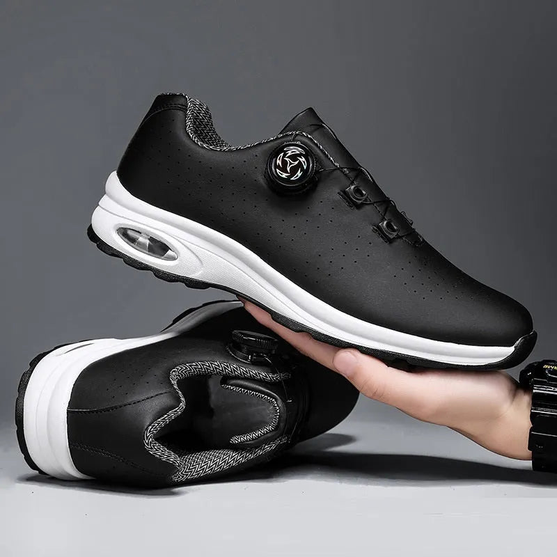 Men's black and white low-top mesh casual tennis shoes with cross straps and lace-up front
