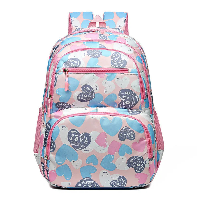 Blue Oxford cloth student backpack with air pillow shoulder straps shown open