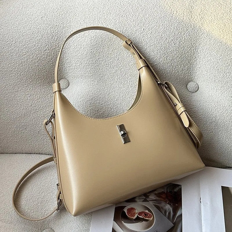 Genuine leather dumpling-shaped crossbody bag in apricot colour with shoulder strap