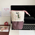 Cartoon collapsible pencil case in Oxford fabric measuring 17cm by 14cm