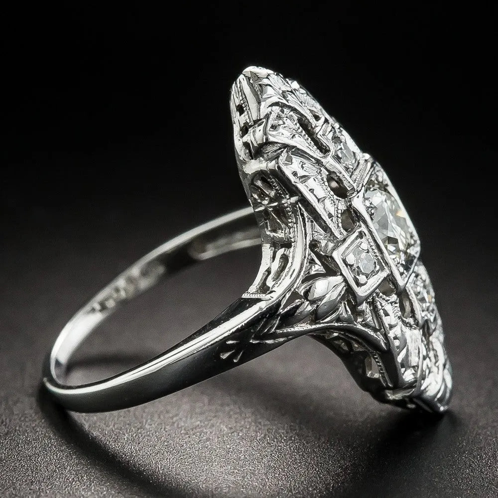 Silver electroplated geometric copper ring with hollow out design and diamond stud accents
