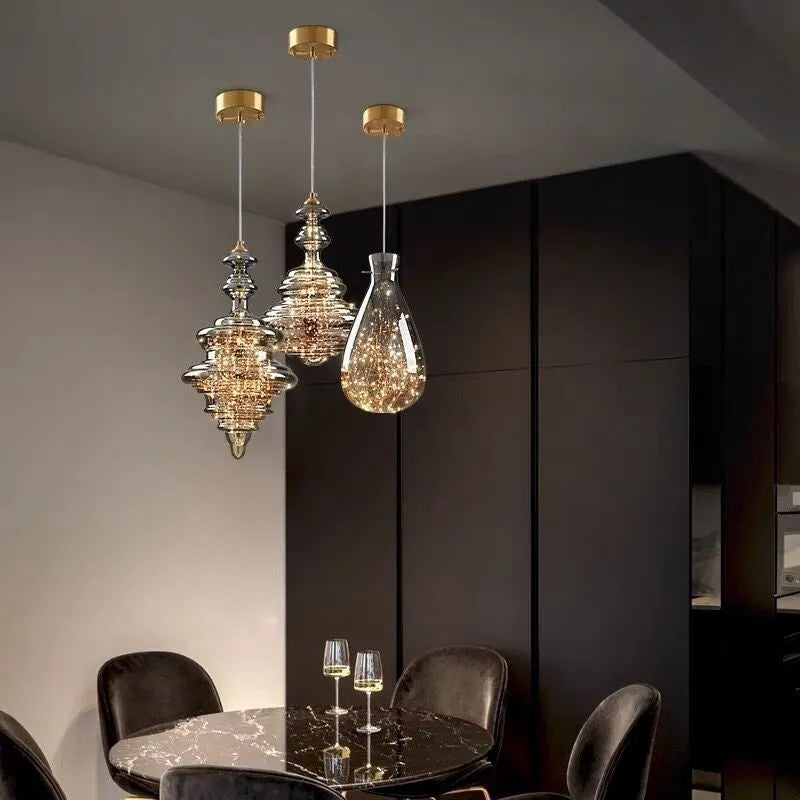 Modern glass droplight chandelier with adjustable suspension showing clean contemporary design