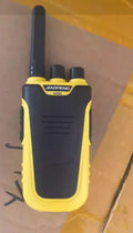Red and yellow high-power portable intercom showing compact size and display.