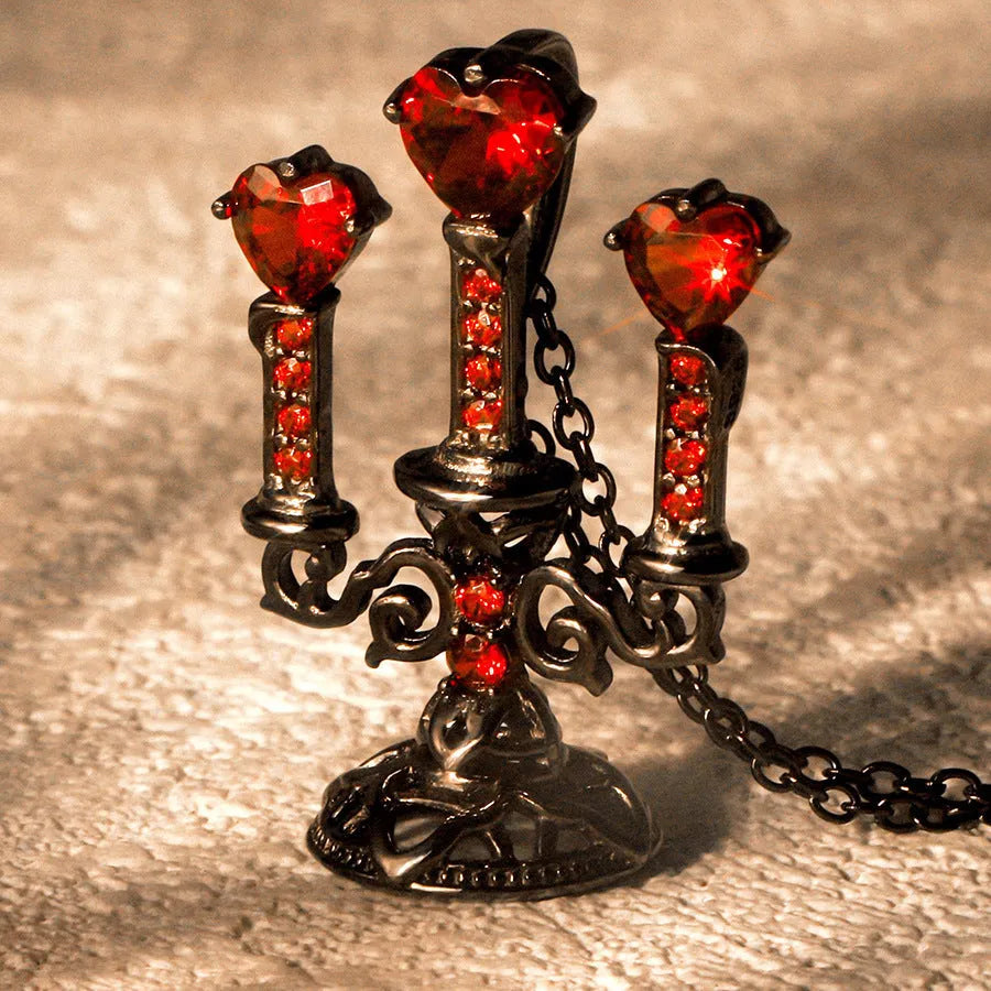 Gothic style zinc alloy clavicle chain necklace with a hollow candlestick pendant on a cross chain.