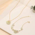 925 silver orchid flower pendant necklace with a peace buckle on an O-ring chain.